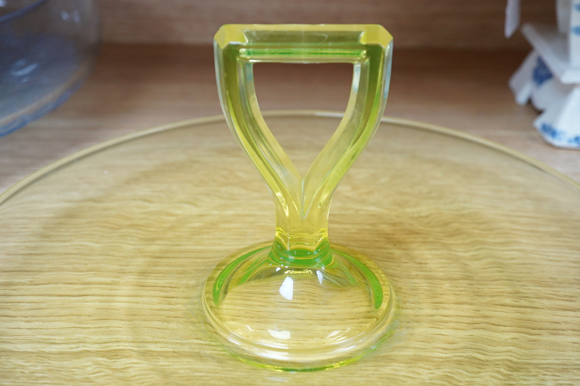 A Muller Art Deco glass dish, together with a uranium glass cake stand, largest 32cm in diameter